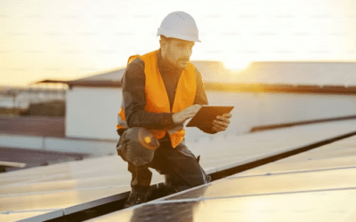 Guy checking on a solar panel